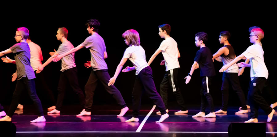 Rubicons flagship boys group, Re:BOUND, performing at the Schools Dance Festival, St Davids Hall.
